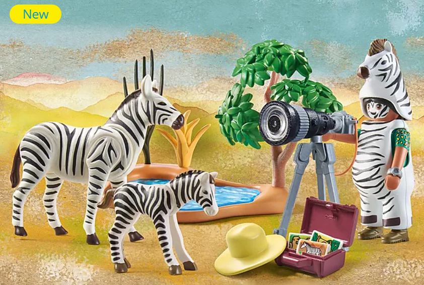 Wiltopia Photographer with Zebras